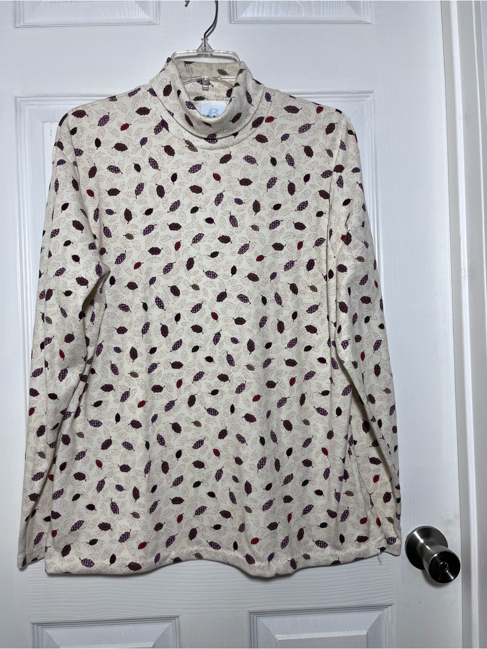 Bobbie Brooks Cream Turtleneck Knit Top with Burgundy and Purple Leaf Print
